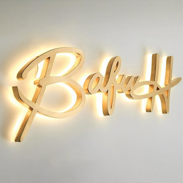 Personalisierte LED-Firmenbeschilderung mit 3D-Metallbuchstaben und warmer weißer Hintergrundbeleuchtung in Gold/Messing oder Silber - Bild 1