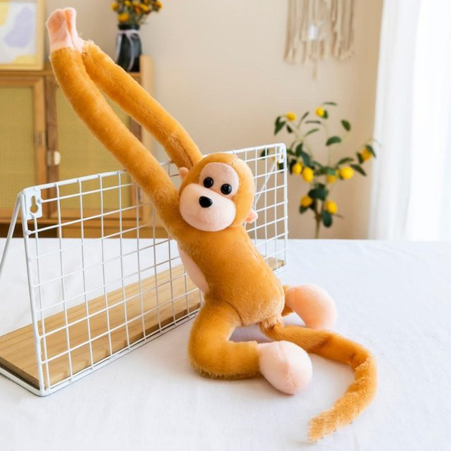 Bloom Play Hängender Affe als weiches Kuscheltier für Kinder in Orange - Bild 1
