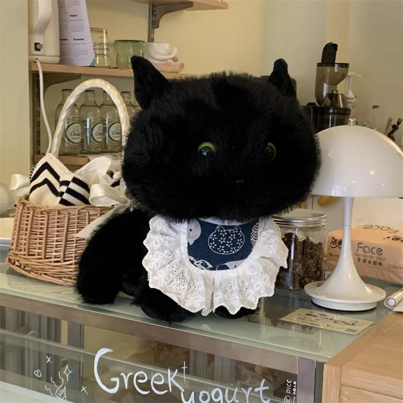 Kidsly Schwarze Katze mit Lätzchen, Plüschtier, 30cm - Bild 1