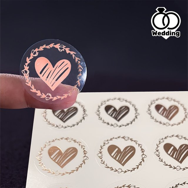 100 Stück herzförmige selbstklebende Aufkleber in Gold und Transparent für Hochzeitseinladungen und Geschenkverpackungen - Bild 1