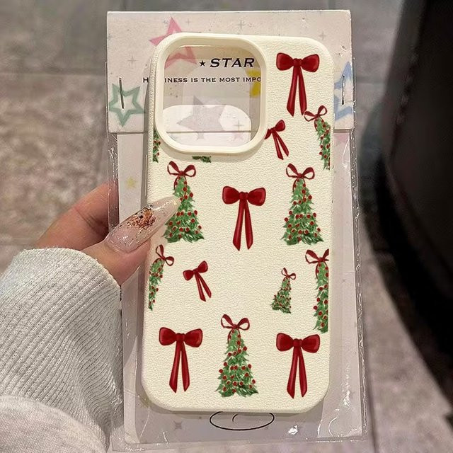 Handyhülle mit Weihnachtsbaum und roter Schleife für iPhone 17 16 15 14 13 12 11 Pro Max Plus XR in Rot und Weiß aus Soft TPU - Bild 1