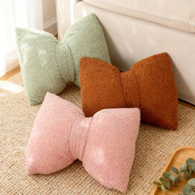BUYNOW Kuschelkissen mit Schleife in Rosa im minimalistischen koreanischen Stil inklusive Füllung - Bild 1
