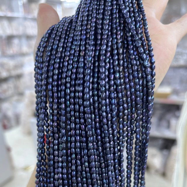 Punch Perlen, schwarze Süßwasserperlen, Reisform, 2–8 mm, Unisex - Bild 1