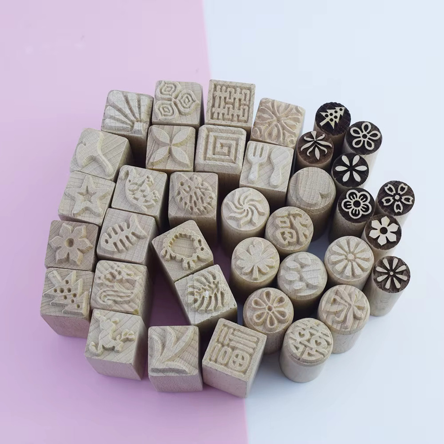 Musterstempel Set für Ton mit Blumen, Blättern und Tieren aus Holz für Keramik und Polymer Clay - Bild 2