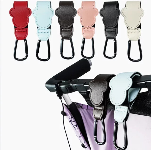 Drehbare Kinderwagen Haken aus PU Leder in Pink als Organizer für den Kinderwagen Warenkorb - Bild 1
