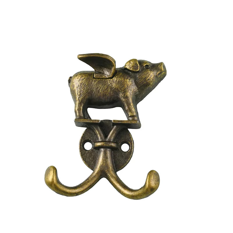 Flying Pig Wandhaken aus Metall in Gold als dekorative Kleiderstange und Handtuchhaken für Badezimmer, Küche oder Schlafzimmer - Bild 2