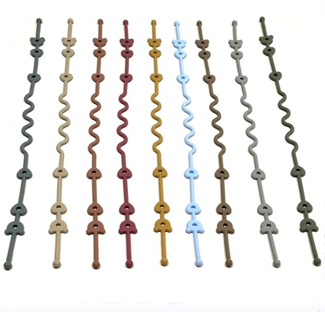 Schnullerclip für Babys aus Silikon in Grün und Multicolour - Bild 1