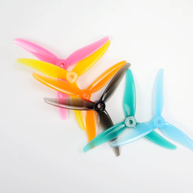 Gemfan Hurricane 51466 5 Zoll 3-Blatt Propeller Set für RC FPV Drohnen, 2 Paar, Pink/Multicolor - Bild 1