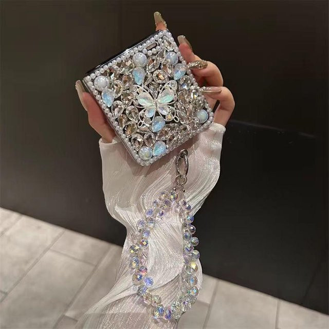 Elegante Handyhülle mit Kristallperlen und Schmetterling-Edelsteinen für Samsung Galaxy Z Flip 3, Z Flip 4, Z Flip 5 und Z Flip 6 in Silber - Bild 1