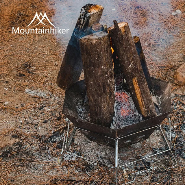 MOUNDAINHIKER Camping-Grill aus Edelstahl, tragbar und faltbar mit Holzkohlegrillrost für Trekking und Outdoor-Kochen - Bild 1