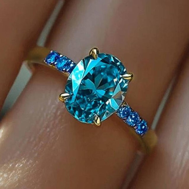 Huitan Damenring, goldfarben, blauem Zirkonia - Bild 1