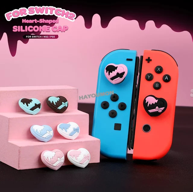 Pogopirate 4er Set Silikon Daumen Grip Kappen Anti-Slip Schutzhüllen für PS5, PS4, Nintendo Switch, Lite und OLED in Weiß und Pink - Bild 1