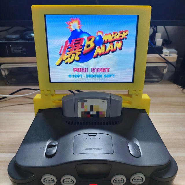 KFDER Retro Tragbare Faltbare Spielkonsole mit 8-Zoll Bildschirm und High-Fidelity-Stereosound in Gelb, Geeignet für N64 Ersatzbildschirm - Bild 1