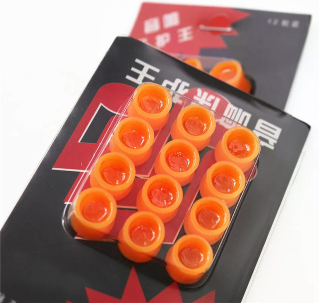 JETTING 12 Stück Staubschutzkappen für 3,5 mm Jack Audio-Anschlüsse in Orange - Bild 1