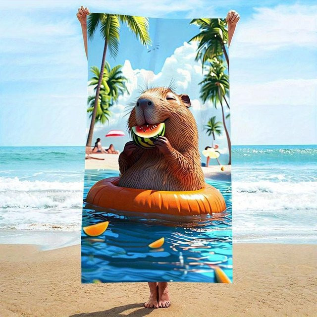 Strandtuch mit Capybara auf Schwimmring beim Wassermelone-Essen, Breite: 30 cm, Höhe: 60 cm - Bild 1