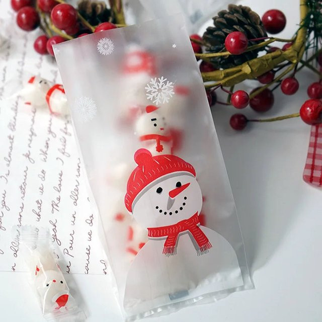 50 Stück Schneemann Geschenkbeutel aus weißem Kunststoff für Süßigkeiten und Gebäck zur Weihnachts- und Winterparty Dekoration - Bild 1