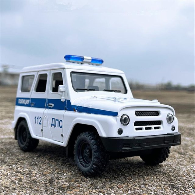 Linyi toy car Uaz Hunter Automodell, Polizei, Metall, mit Ton und Licht, 1:20 - Bild 1