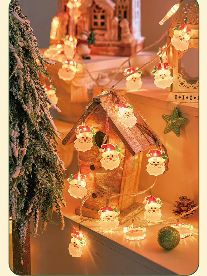 Batteriebetriebene LED Lichterkette mit bunten Weihnachtsfiguren wie Weihnachtsmann, Schneemann und Elch für deine Weihnachtsdekoration und Partys - Bild 4