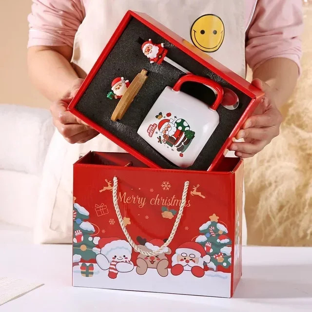 Weiße Keramiktasse mit Deckel und Löffel in Geschenkbox - Bild 1