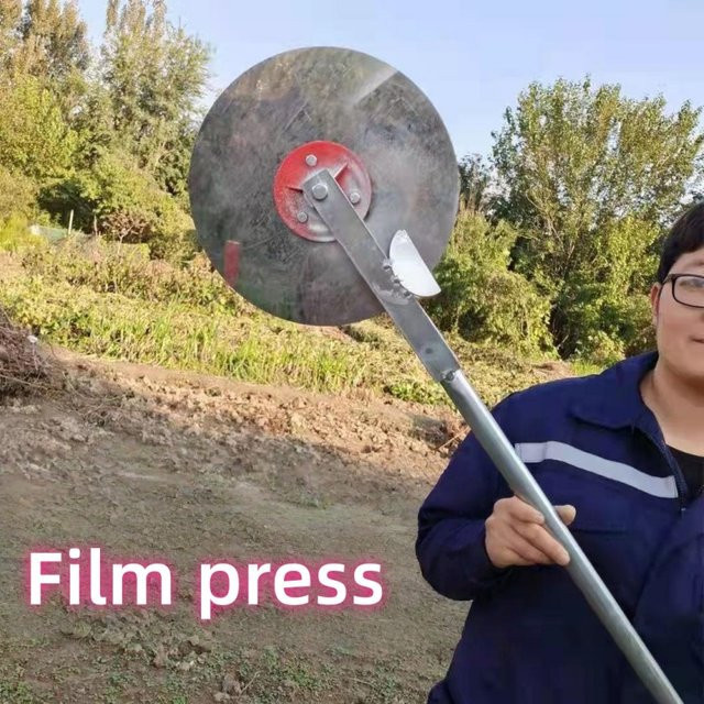 Professionelle landwirtschaftliche Filmpresse aus Edelstahl in Silber für die Bodenabdeckung von Knoblauch und Zwiebeln - Bild 1