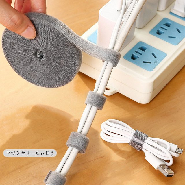 Multifunktionaler USB Kabel Organizer und Draht Wickler zum DIY-Zuschneiden in Weiß und Grau - Bild 1