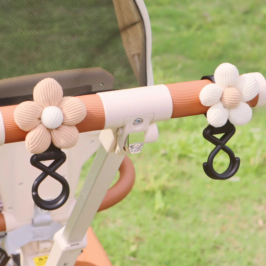 Multifunktionaler Kinderwagen Haken als Zubehör für Babywagen in Beige oder Schwarz - Bild 1