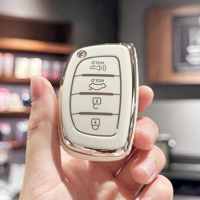 Autoschlüsselhülle mit Schlüsselanhänger für Hyundai Elantra Tucson Sonata Elantra GT Ioniq in Weiß und Gold - Bild 1