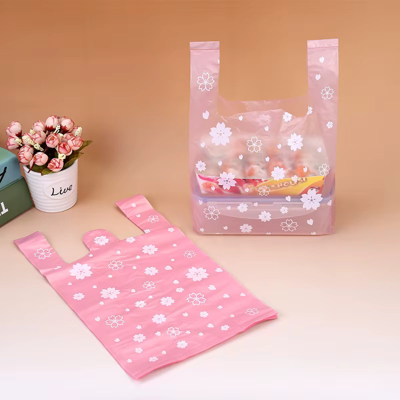 100 Stück verdickte Plastiktüten mit Griff in Pink für Party und Geschenke - Bild 1