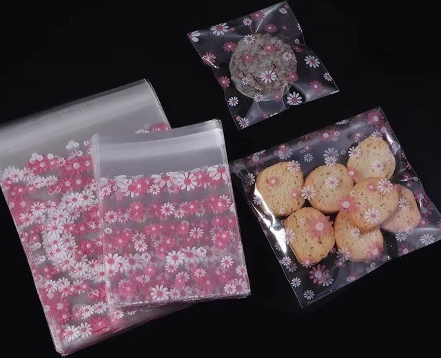 100 Stück selbstklebende Gänseblümchen-Plastikverpackungsbeutel in Transparent für Kekse, Süßigkeiten und Schmuck - Bild 1