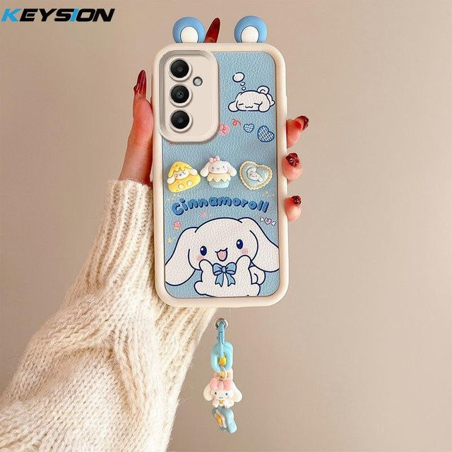 KEYSION 3D Cartoon Handyhülle mit Armband für Samsung Galaxy A55 5G, A35, A25 5G und A15 5G aus weichem Silikon in Blau - Bild 1