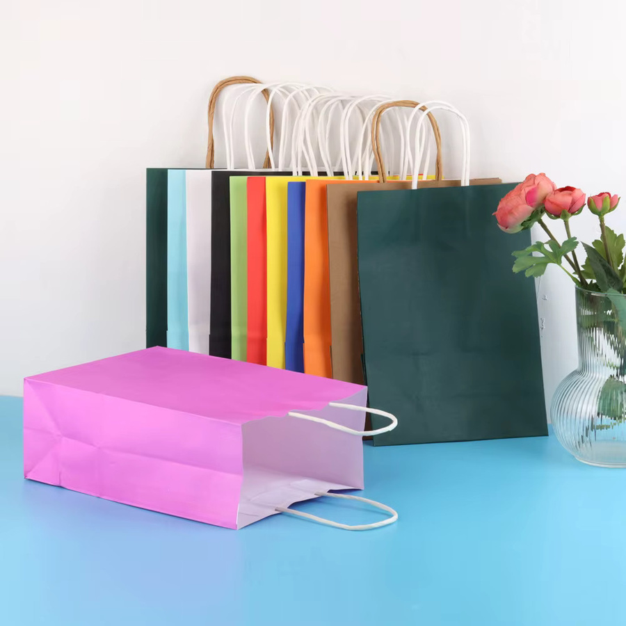 Bunte Kraftpapiertüten mit Griffen für Geschenke und Einkäufe, Mehrfarbig - Bild 2