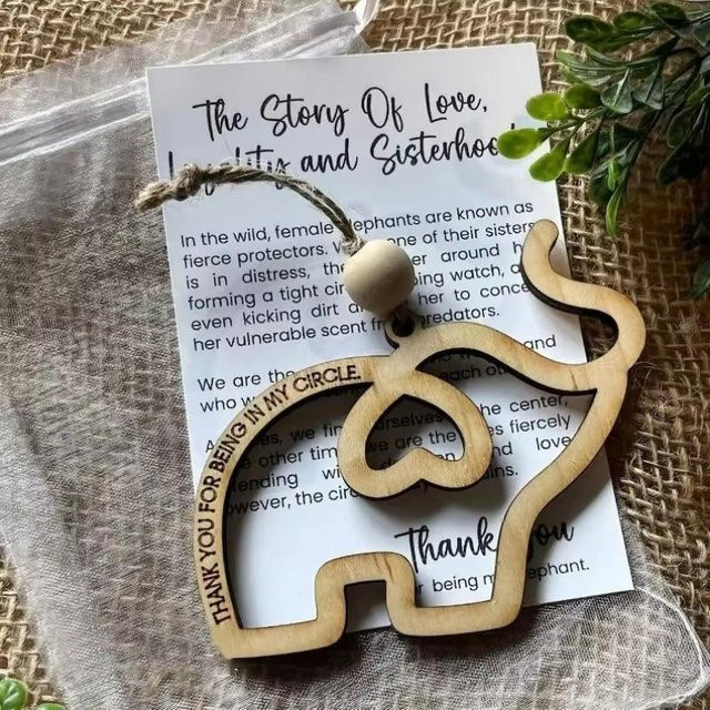 Dekorative Elefanten-Ornamente aus Holz und Kunstharz in Beige als Geschenk für Schwesternschaft und Freunde - Bild 1
