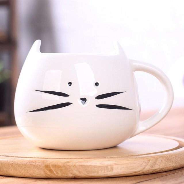 Keramiktasse mit Katzen-Motiv im Cartoon-Stil, Set aus zwei Tassen in Schwarz und Weiß, 400 ml - Bild 1