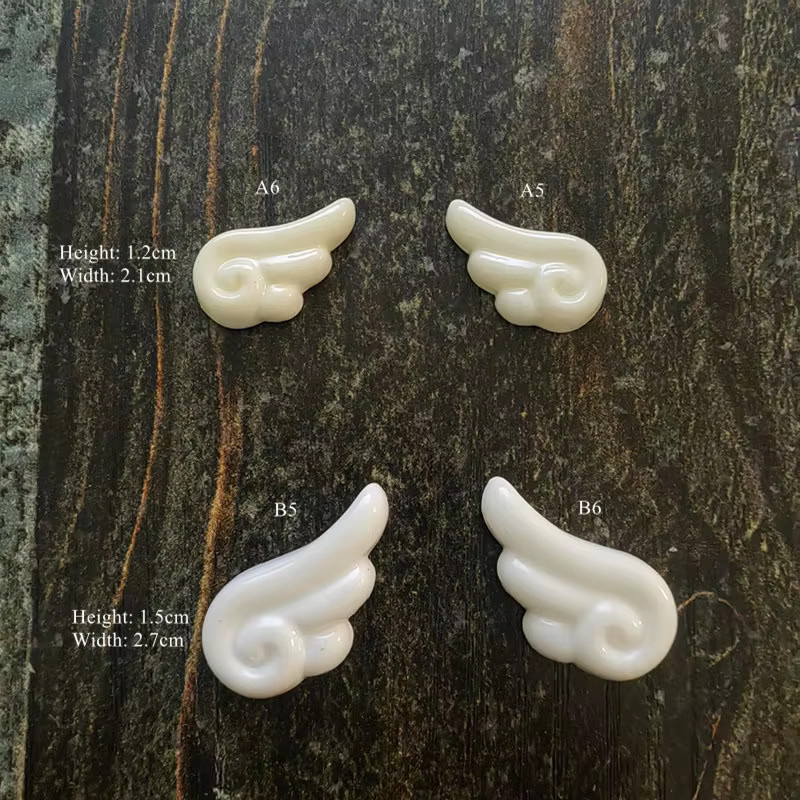 20 Stück weiße Engelsflügel aus Harz als Flatback Cabochon für DIY Bastelbedarf und Scrapbooking - Bild 2