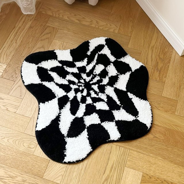 LAKEA Handgetufteter Teppich mit abstraktem 3D-Illusion Design in Schwarz-Weiß - Bild 1