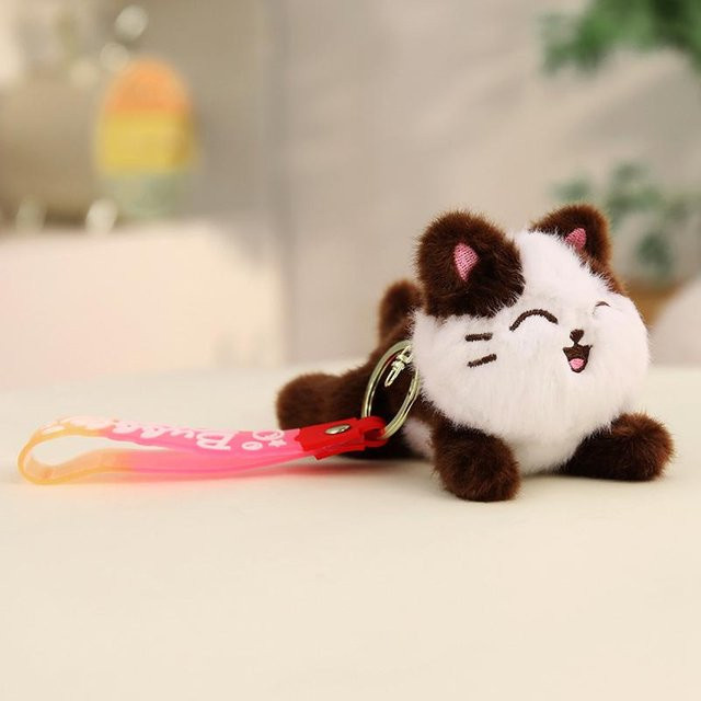 Yiran toy Glückliche Katze Liegende Puppe, Plüschtier, Braun Blau Rosa, ab 14 Jahre - Bild 1