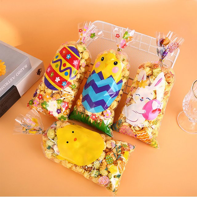 50 Stück Ostern Süßigkeitenbeutel aus Kunststoff mit Kaninchen und Eier-Motiv in Mehrfarbig für Party-Dekoration und Eiersuche - Bild 1
