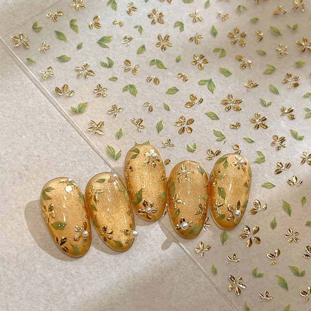 NAILFYOU Nagelaufkleber, 5D Blumen, Goldene Grüne Blätter, Unisex - Bild 1