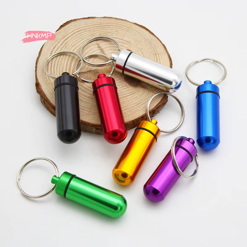 HNKMP Mini-Schlüsselanhänger Pillendose aus Aluminium, wasserdichte Medikamentenbox in Gold und Multicolour - Bild 2