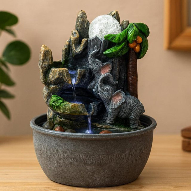 SHAMTAM Tischbrunnen Elefanten und Palme in Grau aus Harz, Höhe: 25 cm, Breite: 25 cm, Tiefe: 25 cm - Bild 1