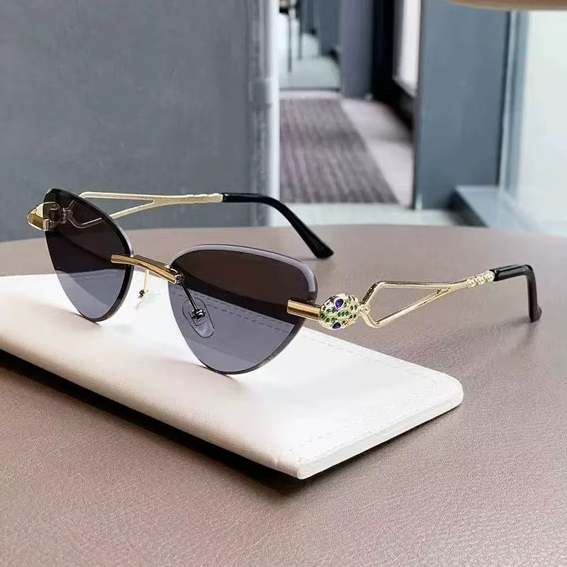 AINII Sonnenbrille Cat-Eye, randlos, Metall, Unisex - Bild 3