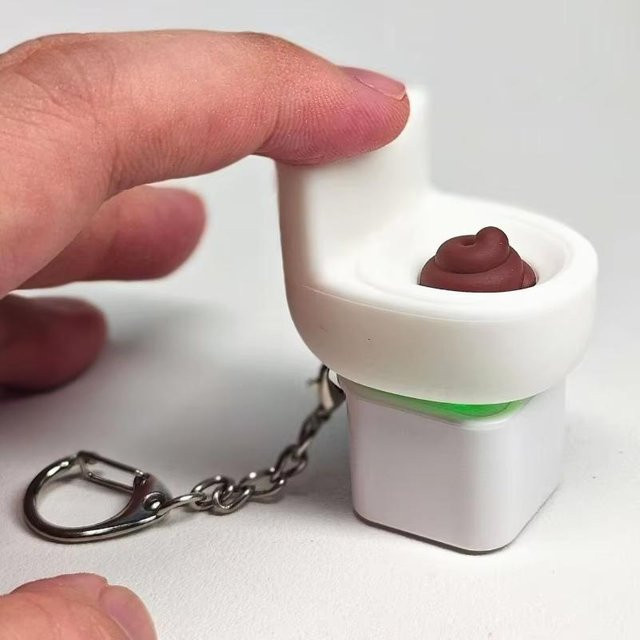 A Family Of Home Textiles Tragbarer Fidget Finger Clicker Schlüsselanhänger, Toilettenform, Stressabbau Sensorisches Spielzeug - Bild 1