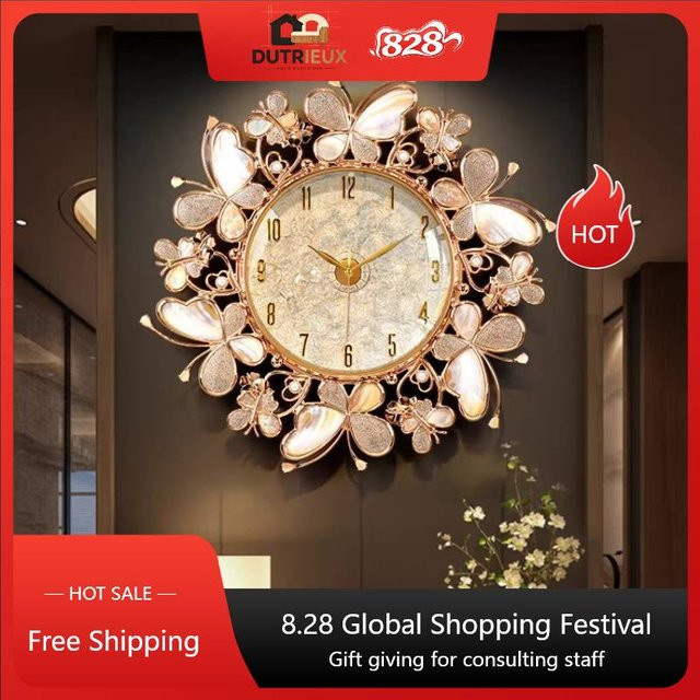 DUTRIEUX Wanduhr in Gold, modernes Design aus Metall mit Quarzwerk - Bild 1