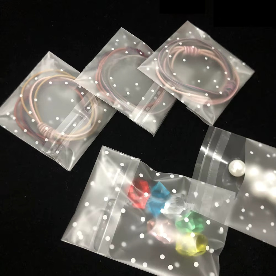 MOONMADE Transparente selbstklebende Schmuckverpackungsbeutel aus Kunststoff, 50 Stück, wiederverschließbar und staubdicht für Süßigkeiten, Kekse oder DIY-Projekte - Bild 2