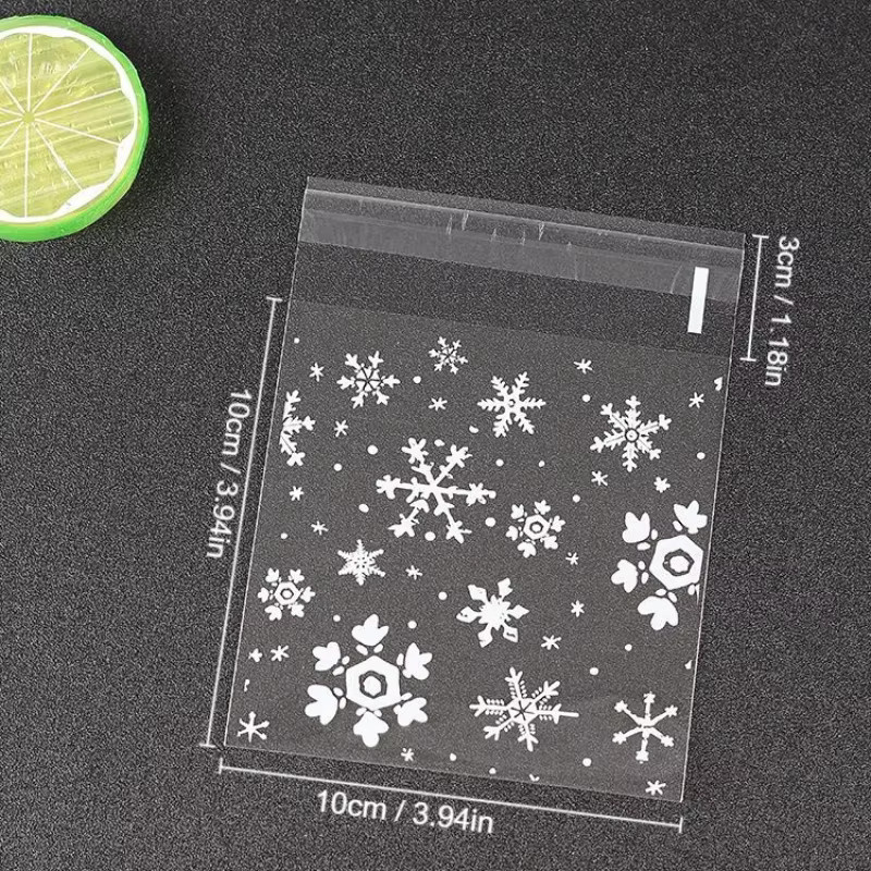 100 Stück Selbstklebende Schneeflocken Geschenkbeutel aus transparentem Kunststoff für Süßigkeiten, Kekse und Snacks zur Dekoration von Hochzeiten, Geburtstagen oder Weihnachtsfeiern - Bild 4
