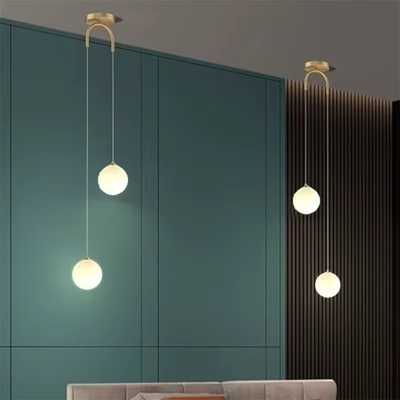 Moderne Glas-Pendelleuchte Ramalho in Transparent mit weißem Globe-Design für Wohnzimmer und Schlafzimmer - Bild 2