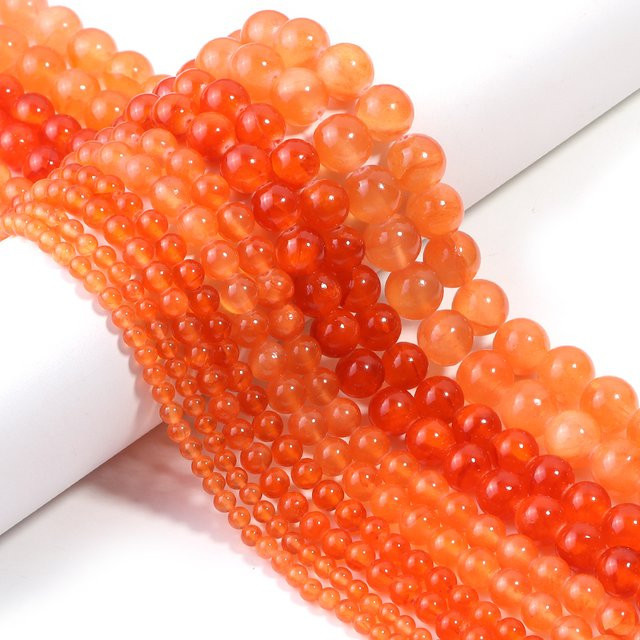 Louleur Natursteinperlen Jade, Orange, Rund, 4-12 mm - Bild 1
