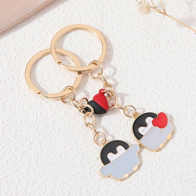 NXQXN Schlüsselanhänger Herz-Magnet-Pinguin, Gold, Unisex - Bild 1