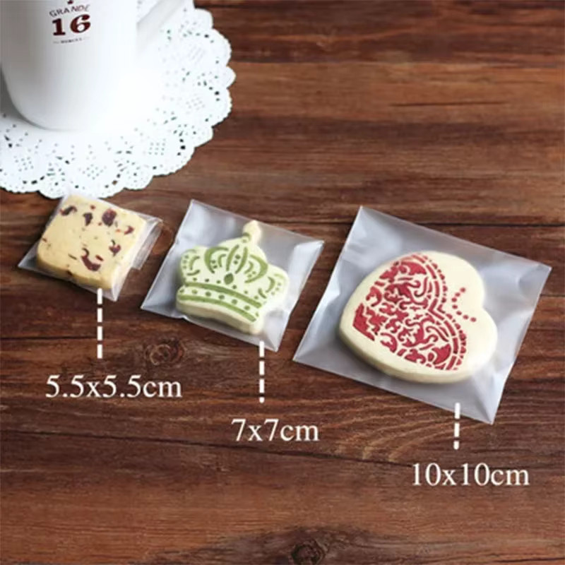 100 Stück transparente selbstklebende Kunststoff-Verpackungsbeutel für Süßigkeiten und Plätzchen - Bild 2
