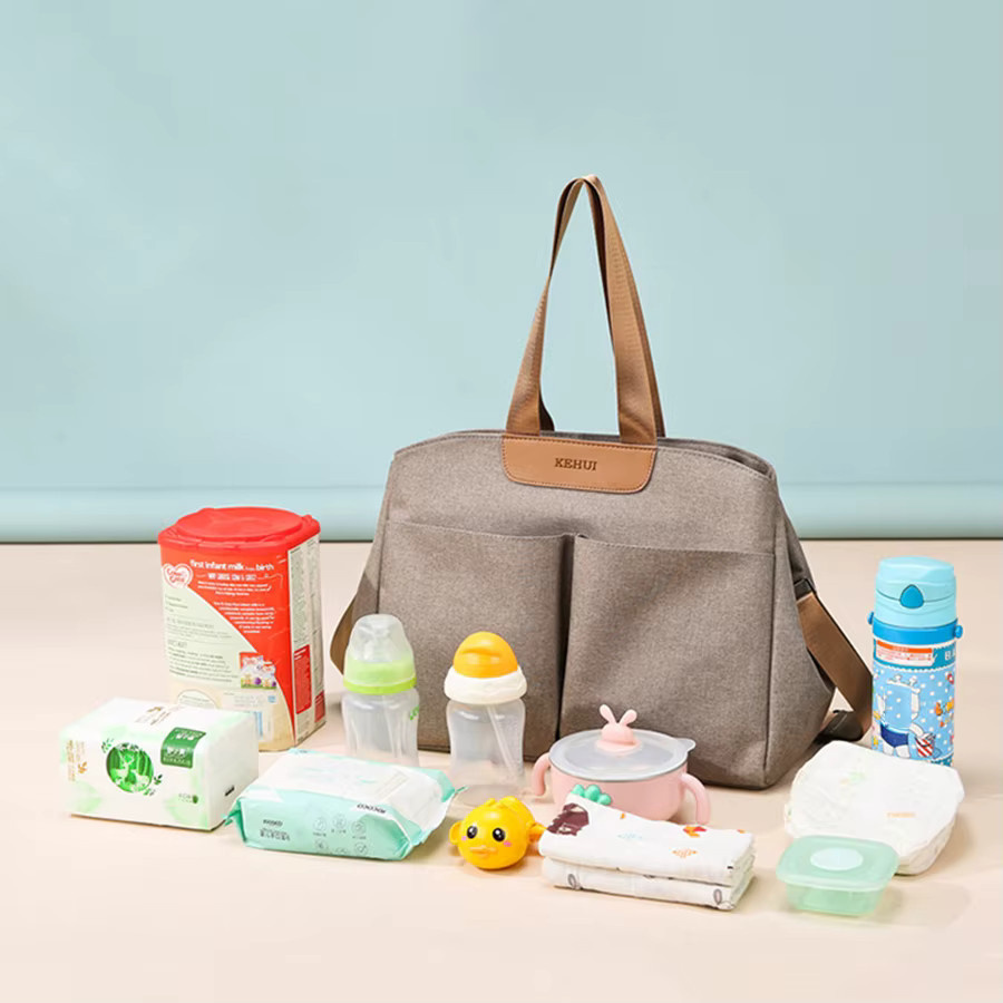 Mommy Bag Multifunktionale Wickeltasche für Mütter inklusive Babyunterlage und Kinderwagenbefestigung - Bild 3
